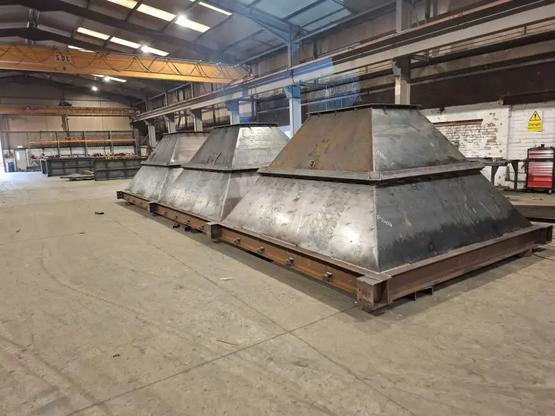 Three-bin frame in workshop